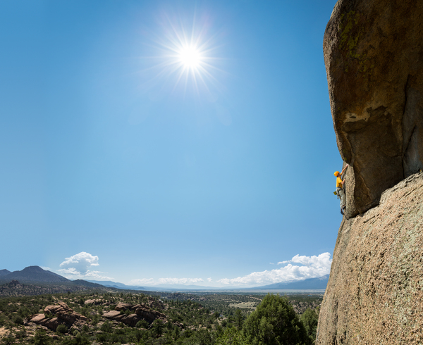 Senior man on steep rock climb in Colorado by Steve Heap