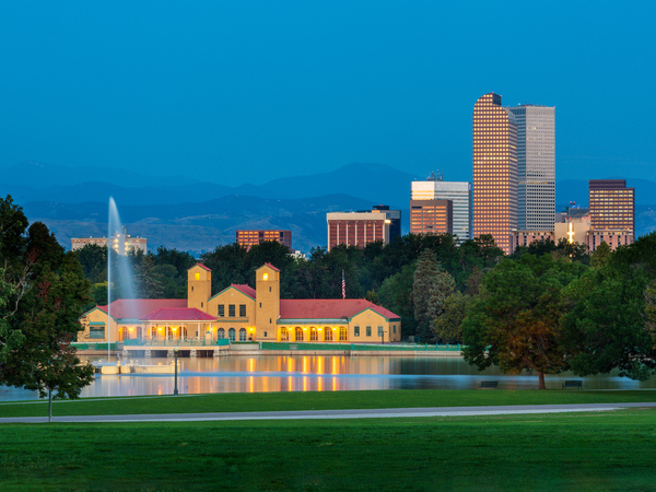 Skyline of Denver at dawn from City Park with boathouse by Steve Heap