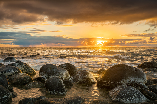 Sunset over rocks from Kee Beach by Steve Heap