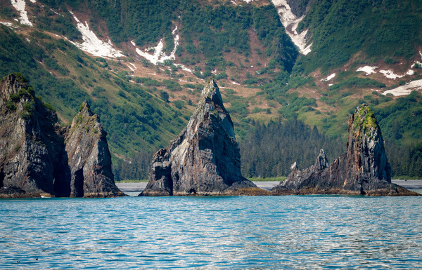 Rocky outcrops in the bay at Seward in Alaska by Steve Heap