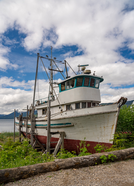 Historic but rotting fishing boat by ocean at Icy Strait Point by Steve Heap