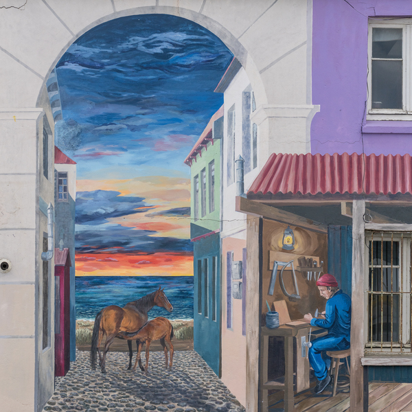 Wall mural of alley on building in Punta Arenas in Chile by Steve Heap