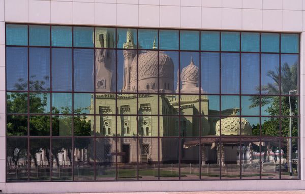 Reflection of the Jumeirah Mosque in Dubai in the windows of an  by Steve Heap