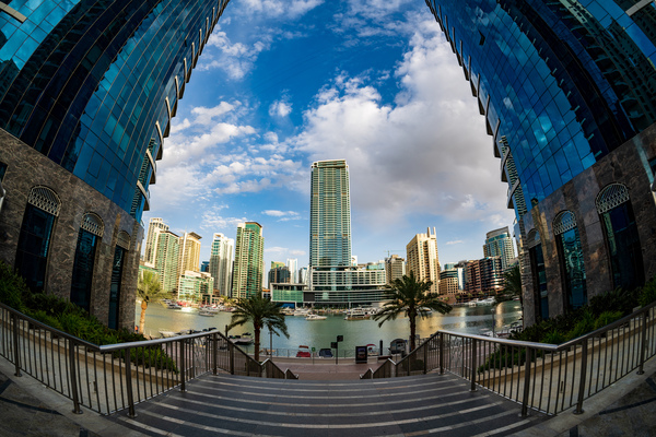 Fisheye view of tall buildings on waterfront at Dubai Marina by Steve Heap