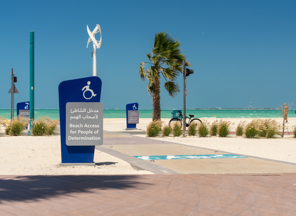 Sign for access to Jumeirah beach for wheelchair users by Steve Heap