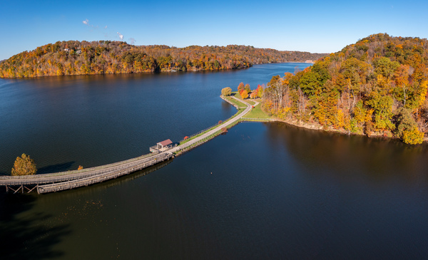 Fall colors surround the lake and trail at Cheat Lake Park by Steve Heap