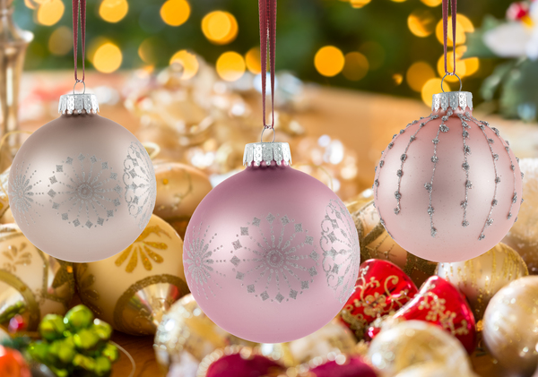 Three Christmas decorations on strings by Steve Heap