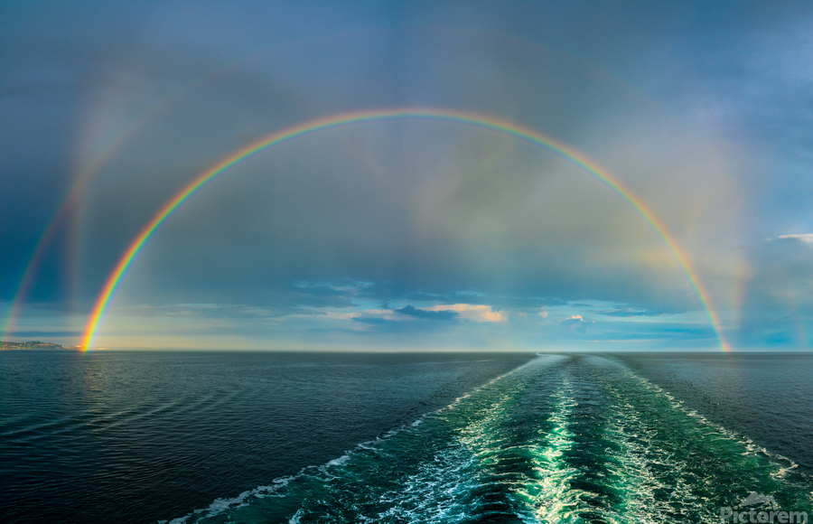 Dramatic double rainbow over wake of ship  Print