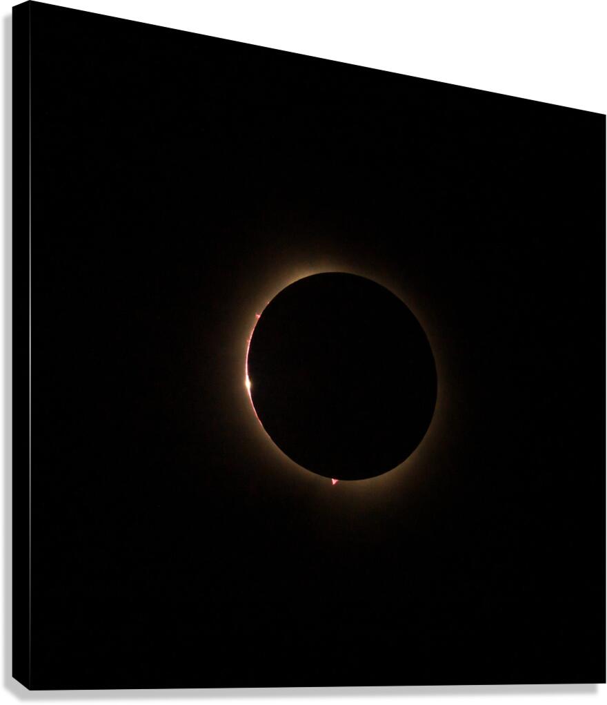 Solar eclipse with the light being seen through lunar canyons.  Canvas Print
