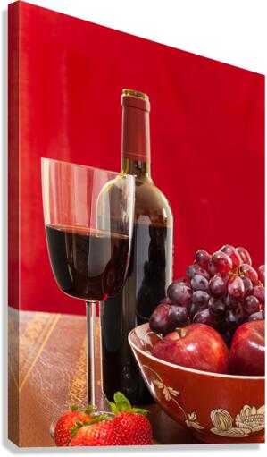 Red wine bottle and fruit with glass  Canvas Print