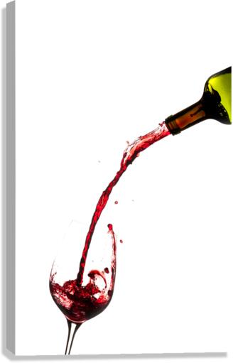 Wine pouring from bottle into glass  Canvas Print