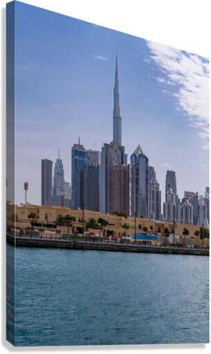 Low rise homes in front of modern apartments of Dubai Downtown d  Canvas Print