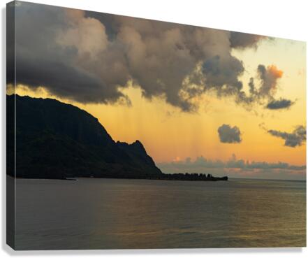 Sunrise over Hanalei bay with silhouette of north shore peaks  Canvas Print