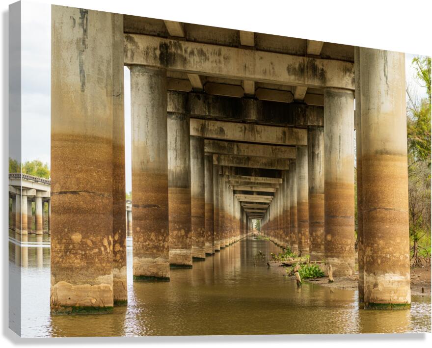 Supporting pillars of I-10 bridge above Atchafalaya basin in Lou  Canvas Print