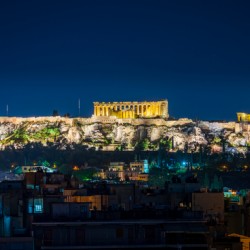 Acropolis hill rises above Athens apartments