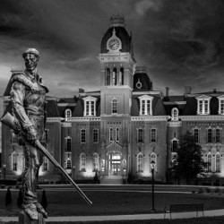 BW Mountaineer statue in front of Woodburn Hall at WVU
