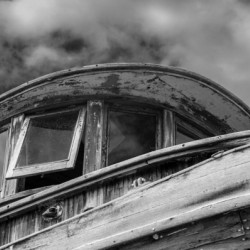Monochrome abandoned fishing boat at Icy Strait Point