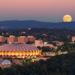 Moon rising above the Coliseum at WVU