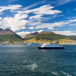 Hebredian Sky expedition cruise ship at anchor in Ushuaia