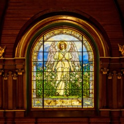 The Angel among the Lilies. Tiffany stained glass window. 1896