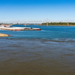 Blue clear water from Ohio river meets brown muddy Mississippi