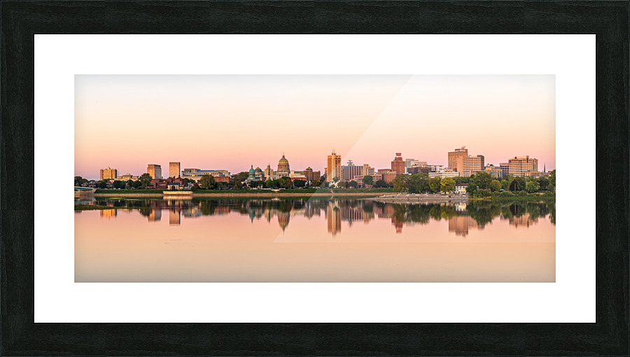 Sunset illuminates the city skyline of Harrisburg in Pennsylvani  Framed Print Print