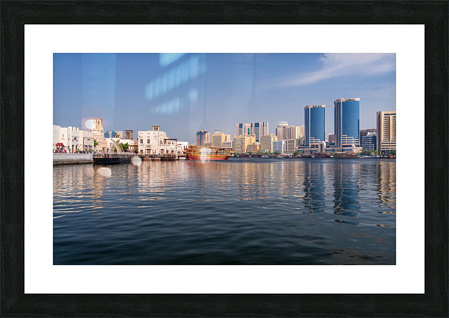 The Creek by Bur Dubai and Al Seef with large docked cruise boat  Framed Print Print