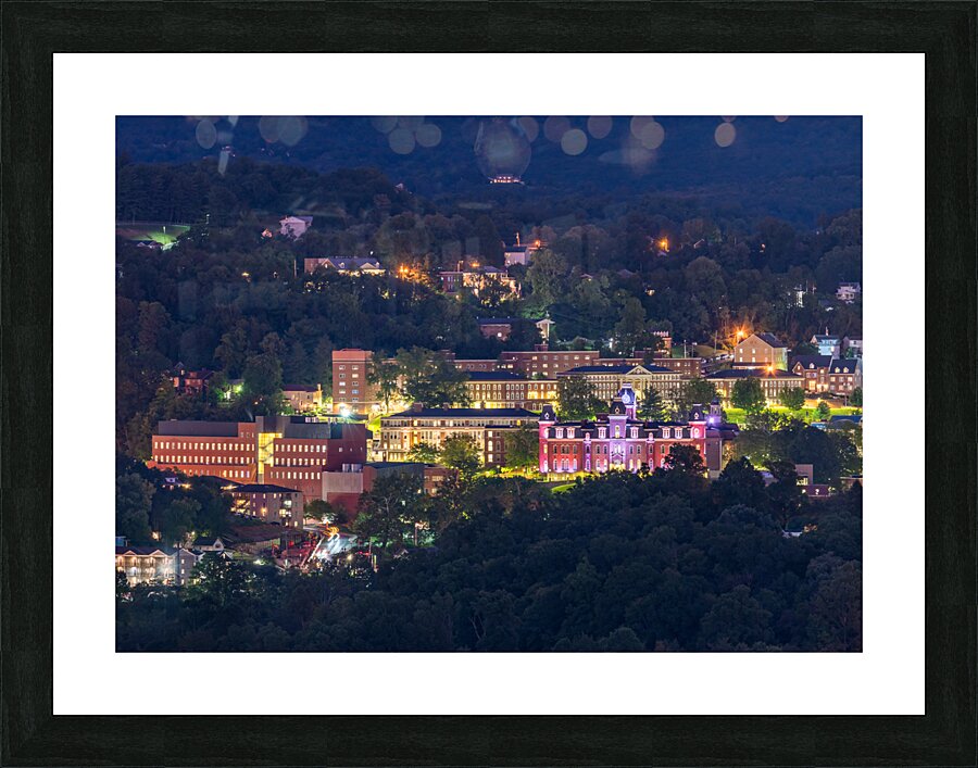 Downtown campus of West Virginia university at nightfall  Framed Print Print