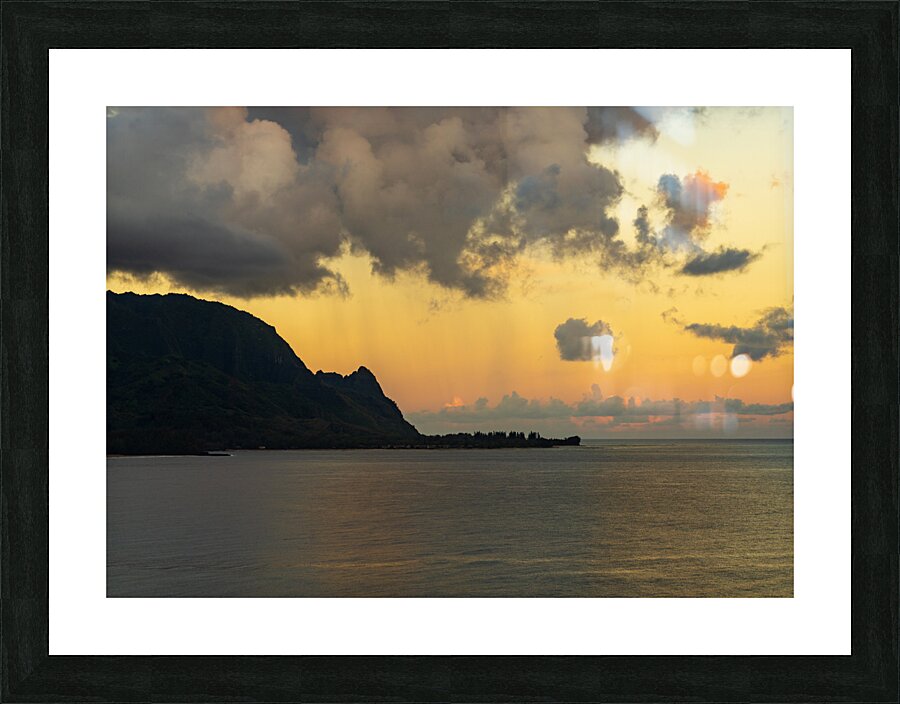Sunrise over Hanalei bay with silhouette of north shore peaks  Framed Print Print