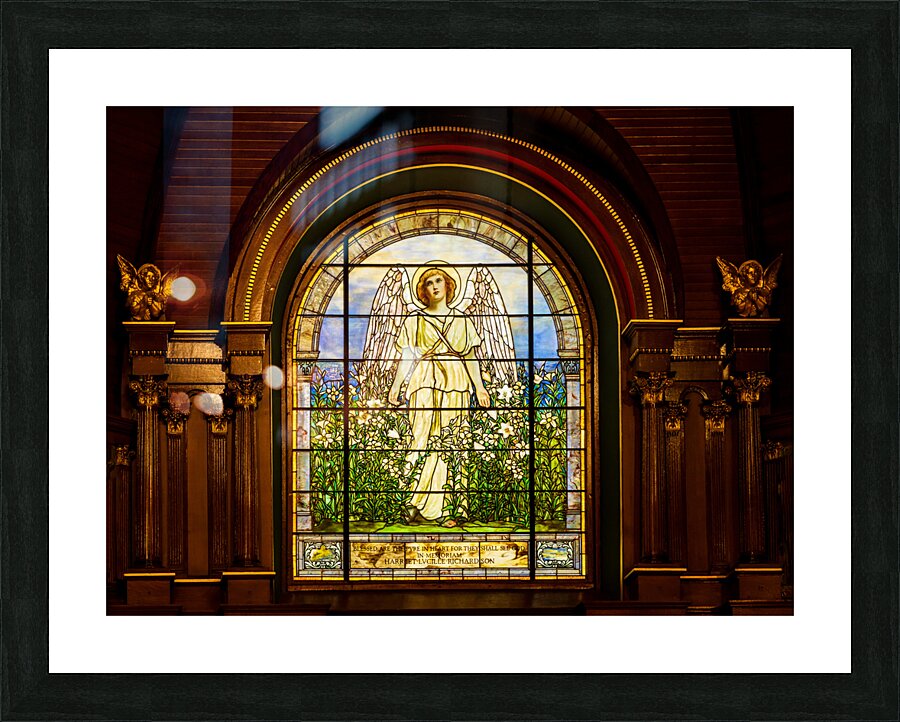 The Angel among the Lilies. Tiffany stained glass window. 1896  Framed Print Print