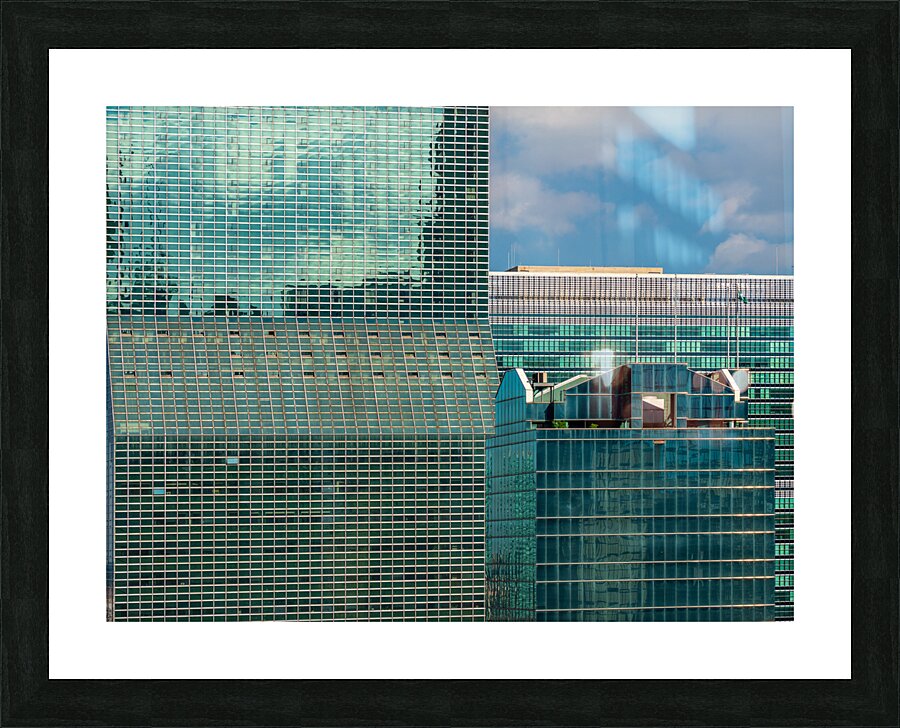 Hundreds of office windows in New York skyscraper  Framed Print Print