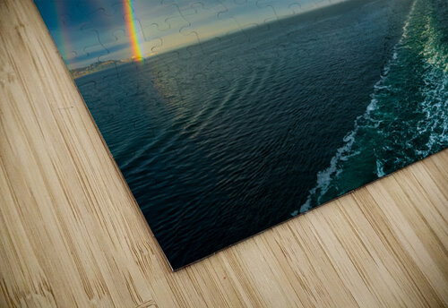 Dramatic double rainbow over wake of ship Steve Heap puzzle
