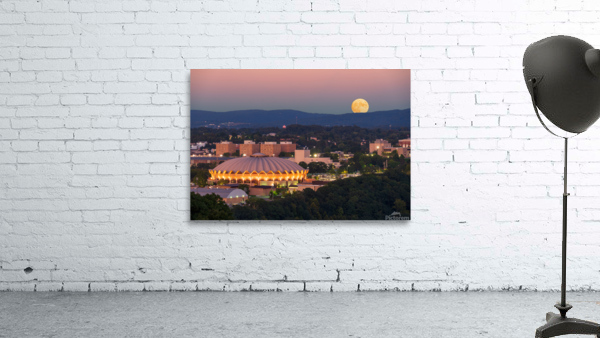 Moon rising above the Coliseum at WVU by Steve Heap