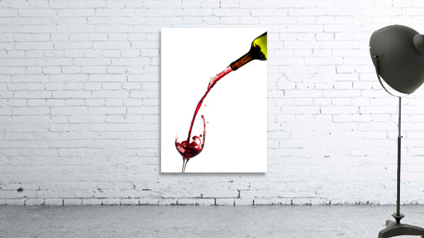 Wine pouring from bottle into glass by Steve Heap
