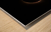 Solar eclipse with the light being seen through lunar canyons. Wood print
