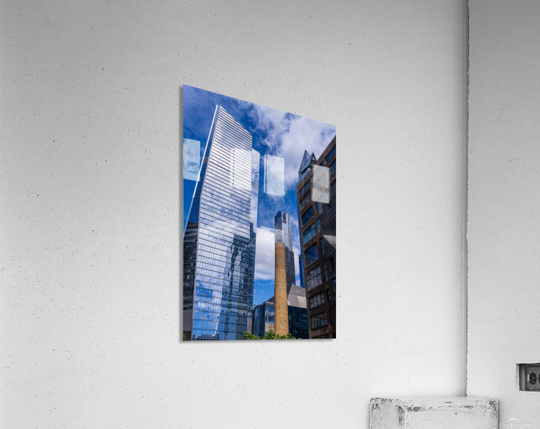 Looking up at modern buildings by brick chimney in Hudson Yards Impression acrylique