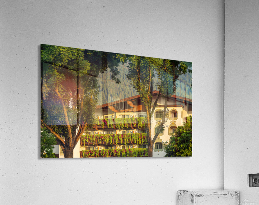 Flower strewn balconies of a hotel in Alpine village of Leavenwo Acrylic Print