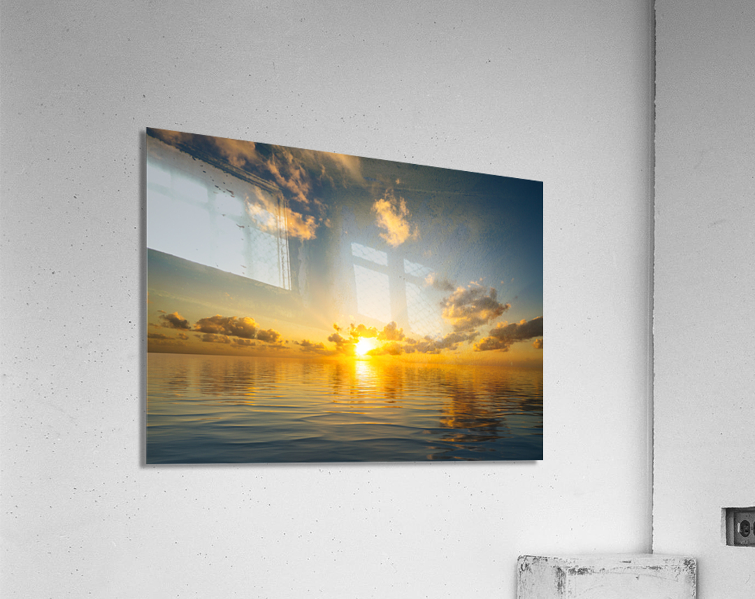 Beautiful sunset reflected in a calm peaceful ocean Acrylic Print
