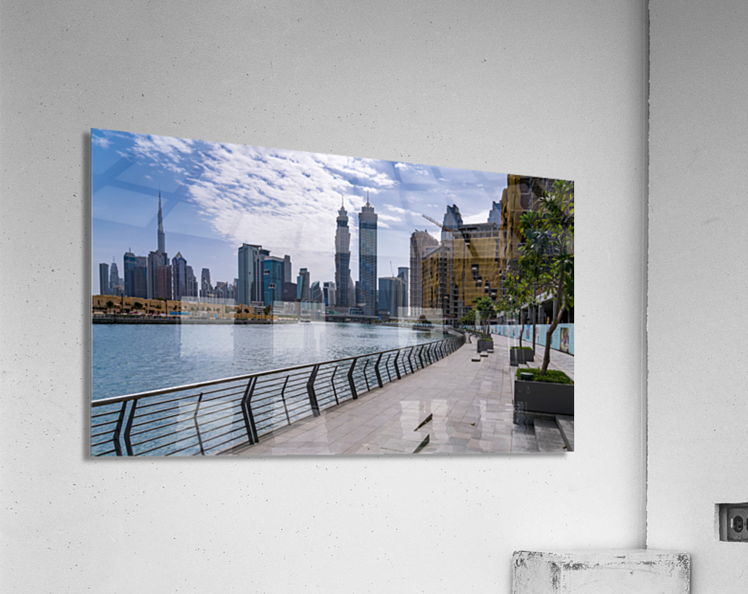 Low rise homes in front of modern apartments of Dubai Downtown d Acrylic Print