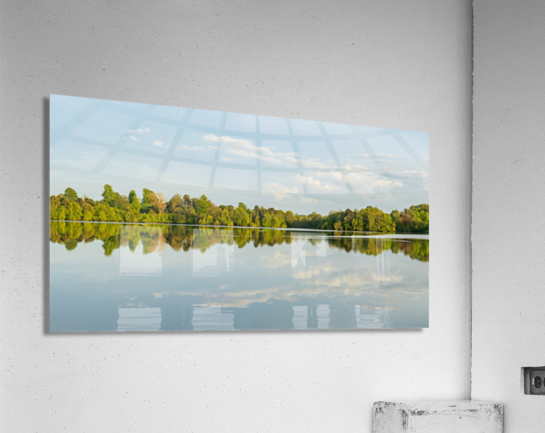 View across the Mere to a clear reflection of distant trees in E Acrylic Print