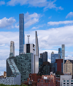 Tall office and apartment buidlings along the waterfront in Hell