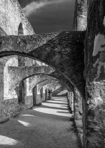 Repeating arches in priest building at Mission San Jose Texas