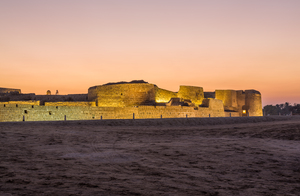 Old Bahrain Fort at Seef at sunset
