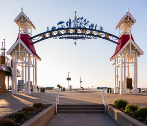 Famous sign above Ocean City boardwalk at sunrise