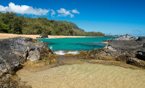 Lumahai Beach Kauai with waves flowing into pool
