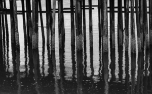 Black and whited wooden pier structure at Icy Strait Point