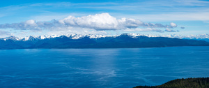 Broad panorama of the mountain range at Icy Strait Point in Alas