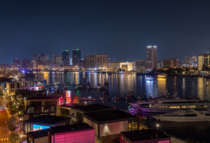 The Creek by Bur Dubai and Al Seef at night with abra boat tours