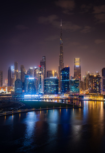 Offices and apartments of Dubai Business Bay with district behin