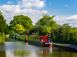 Colorful canal narrowboats in Ellesmere in Shropshire